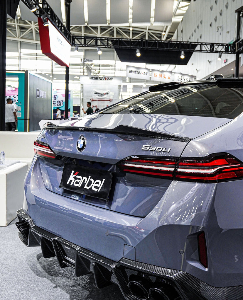 BMW i5 xDrive40 / i5 eDrive40 (with M-package bumper, does not fit base mode) / i5 M60 G60 G61 2024-ON & 5 Series 540i xDrive / 530i xDrive / 530i (with M-package bumper, does not fit base model) / 550e xDrive G60 G61 2024-ON with Aftermarket Parts - Pre-preg Carbon Fiber Rear Spoiler from Karbel Carbon