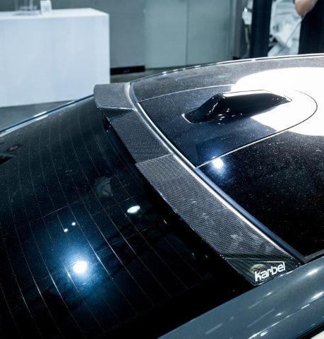 BMW i5 xDrive40 / i5 eDrive40 (with M-package bumper, does not fit base mode) / i5 M60 G60 G61 2024-ON & 5 Series 540i xDrive / 530i xDrive / 530i (with M-package bumper, does not fit base model) / 550e xDrive G60 G61 2024-ON with Aftermarket Parts - Pre-preg Carbon Fiber Rear Roof Spoiler from Karbel Carbon